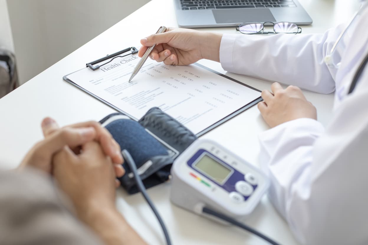 Doctor reviewing clinical information with a patient